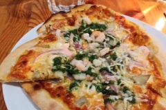 Shrimp Pesto Pizza  - Rocky Mountain Flatbread;  Dining on Flat Bread Pizza after Snowtubing Adventure on Cypress Mountain - Adventures in Vancouver, British Columbia.  (C) 2020: Photos by Thomas Baurley, Leaf McGowan, Techno Tink Media; www.technotink.net/photography.  Full adventure tales at www.technotink.net/adventures. Photo taken on Saturday, January 4, 2020.