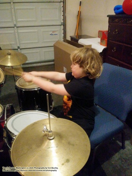 Cian playing the drums at the AirBnB in Renton, Washington. The Adventures of Sir Oisin Leif:  Saga 1 - Dual states at https://technotink.net/adventures/?page_id=2.  Photography on January 13, 2020 by Sir Oisin Leif, Thomas Baurley, Leaf McGowan, Technotink.net/photography  (c) 2020. All rights reserved.