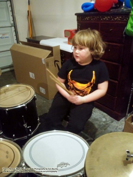 Cian playing the drums at the AirBnB in Renton, Washington. The Adventures of Sir Oisin Leif:  Saga 1 - Dual states at https://technotink.net/adventures/?page_id=2.  Photography on January 13, 2020 by Sir Oisin Leif, Thomas Baurley, Leaf McGowan, Technotink.net/photography  (c) 2020. All rights reserved.