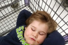 Sleeping in the cart at Winco: January 20, 2020: Renton, Washington. The Adventures of Sir Oisin Leif:  Saga 1 - Dual states at https://technotink.net/adventures/?page_id=2.  Photography by Sir Oisin Leif, Thomas Baurley, Leaf McGowan, Technotink.net/photography  (c) 2020. All rights reserved.