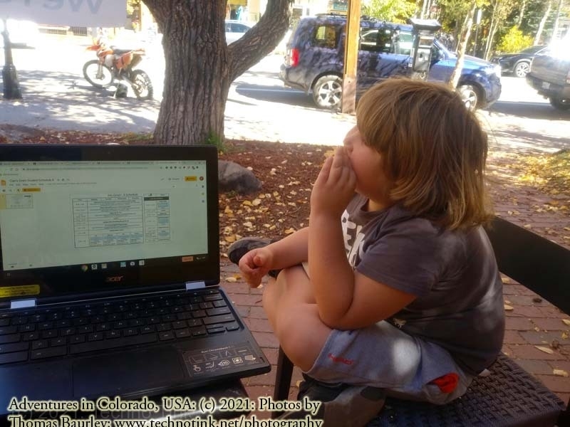 E-schooling/remote learning at starbucks, Breckenridge, Colorado. Exploring Breckenridge, Colorado: September 30, 2020. The Adventures of Sir Oisin Leif: https://technotink.net/adventures/?p=3015  Saga 1 - Dual states at https://technotink.net/adventures/?page_id=2.  Photography by Sir Oisin Leif, Thomas Baurley, Leaf McGowan, Technotink.net/photography  (c) 2020. All rights reserved.