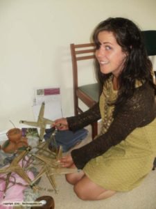 Faerie Moe weaving a cross