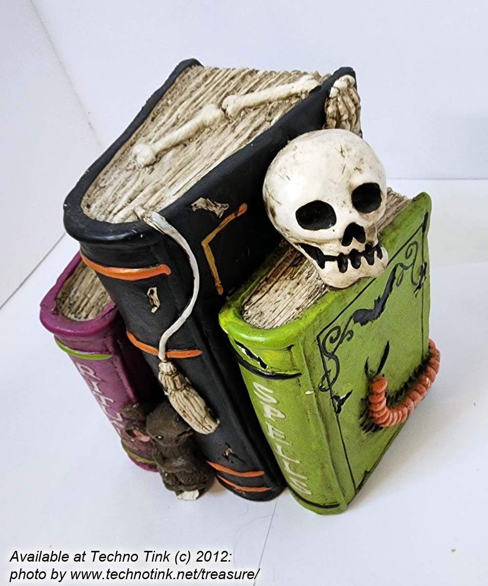 Ceramic or plaster Halloween Bookend of Witchy books