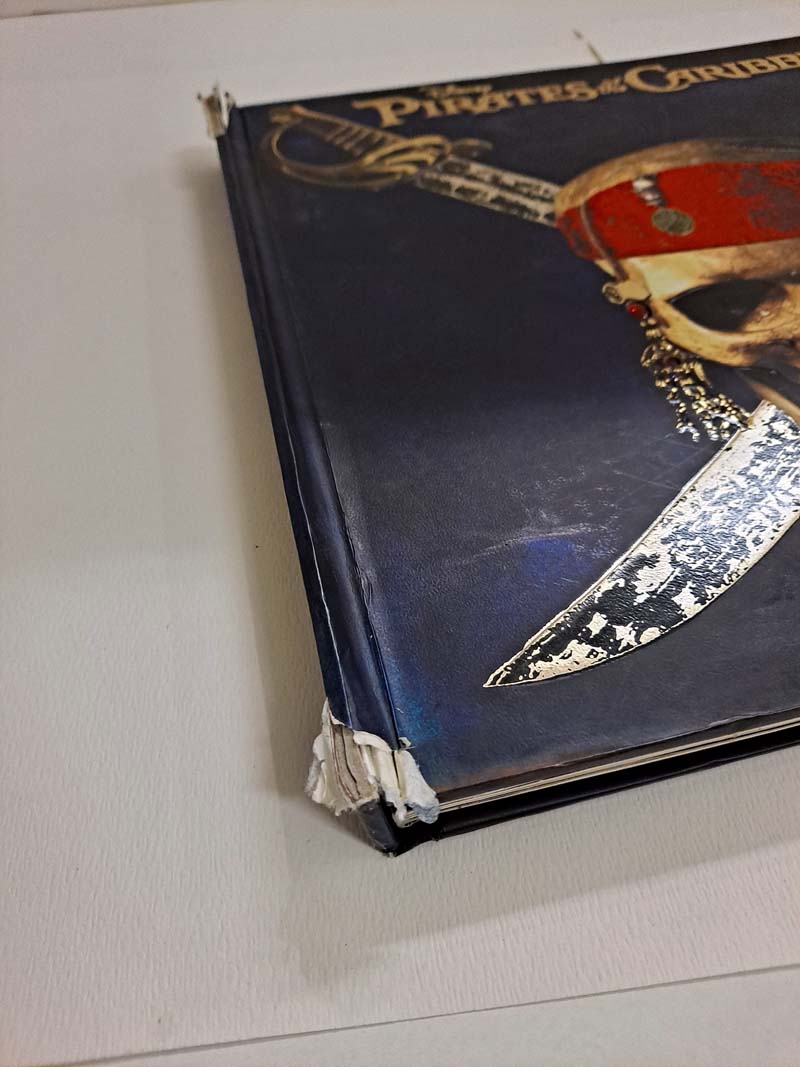 Used Hard Cover Disney's Pirates of the Carribean Book - Image 3