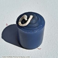 Small blue votive candle