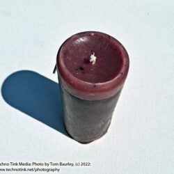 Small purple pillar candle with lavender scent