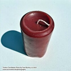 Medium rose geranium or patchouli red scented candle