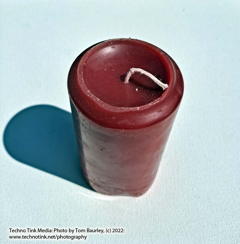 Medium rose geranium or patchouli red scented candle