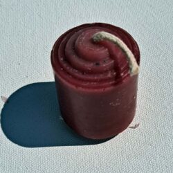 Small red votive candle