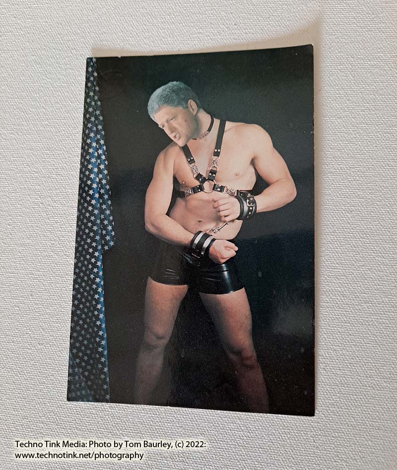 Bill Clinton on Fetish Bondage Model Postcard. Measures approx. 6"x4"