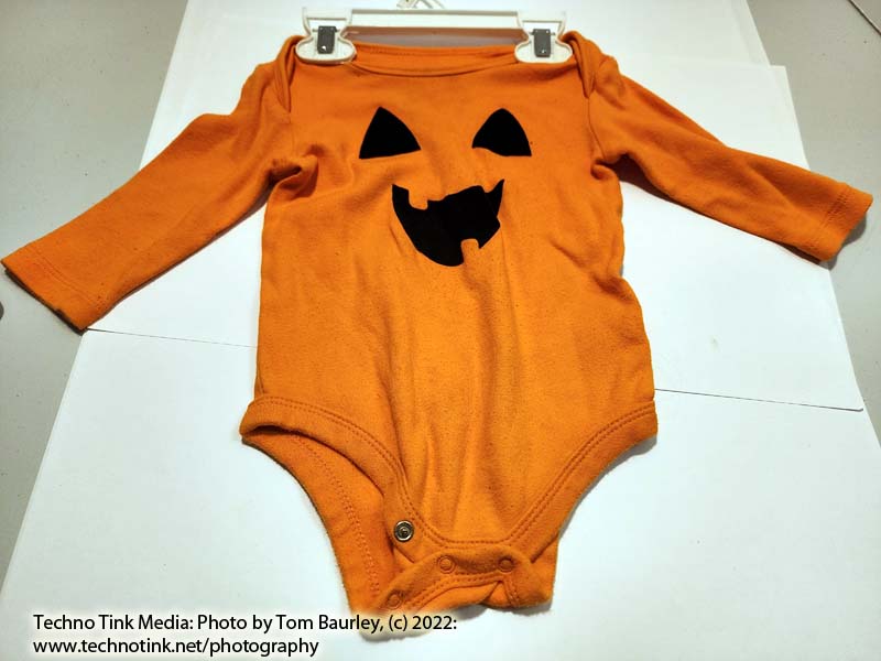 Used Orange 2 tooth Jack-o-lantern face Onesie, Age 6-9 months