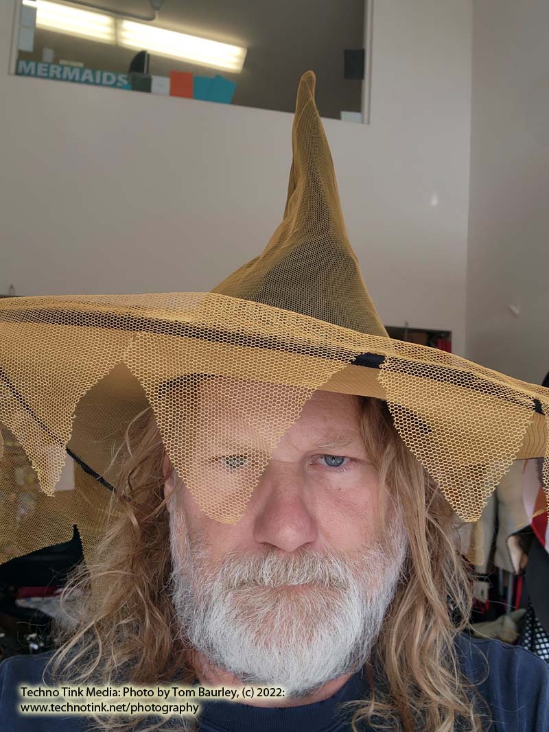 Orange netting over black witch hat - Image 2