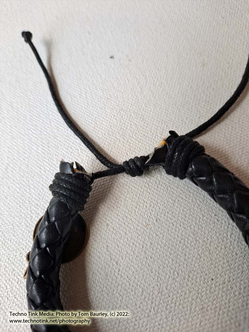 Woven black leather adjustable bracelet with 5 dangling coin charms - Image 4