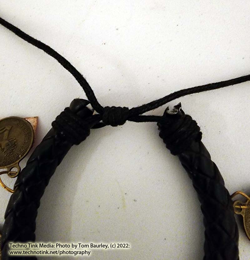 Woven black leather adjustable bracelet with 5 dangling coin charms - Image 7