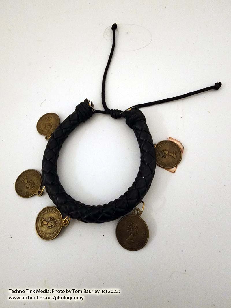 Woven black leather adjustable bracelet with 5 dangling coin charms