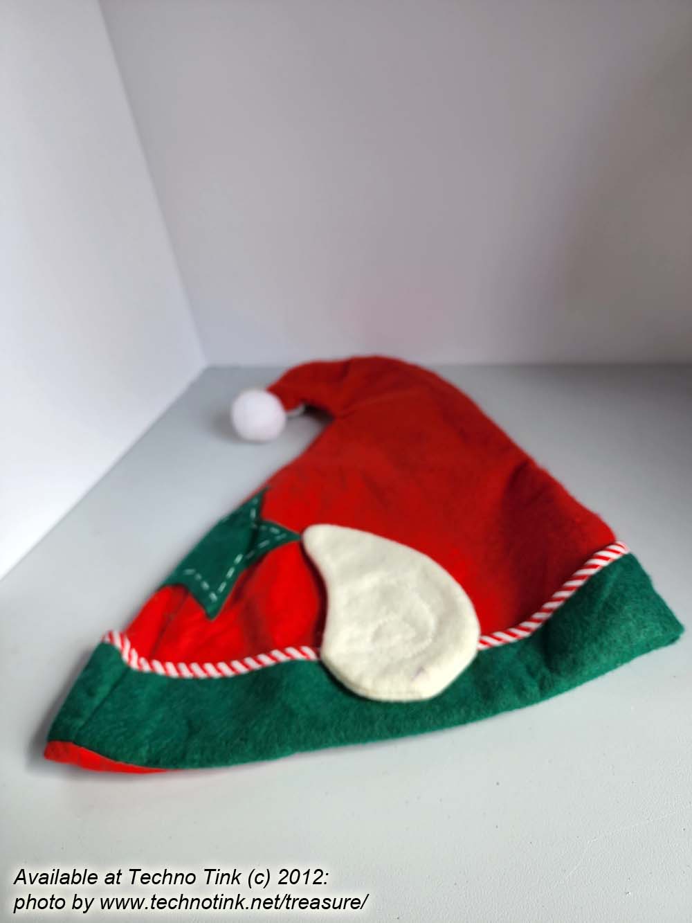 Red Felt Elf Hat with Green Trim and Star