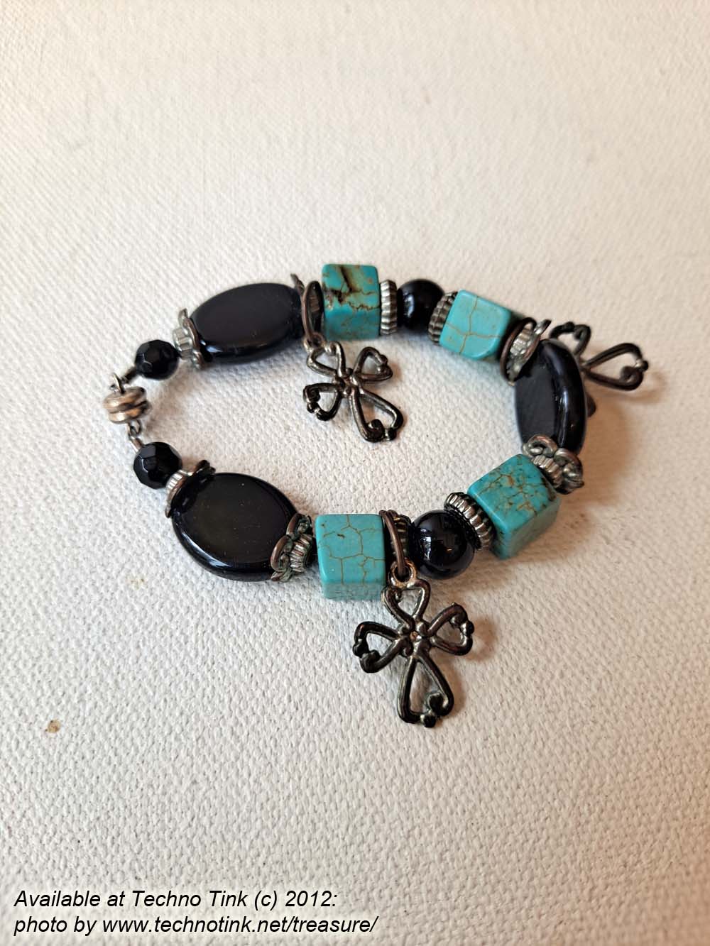 A small Black Jet and Turquoise Coptic Cross bracelet