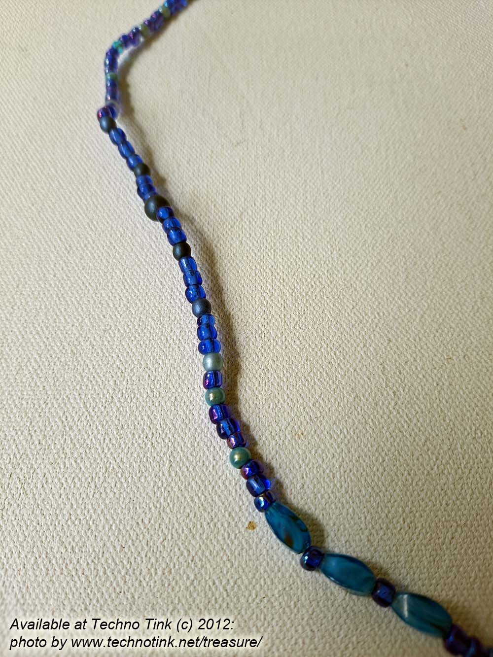 Black-haired dark skin Mermaid Clay Pendant on bright blue ball beaded necklace - Image 4