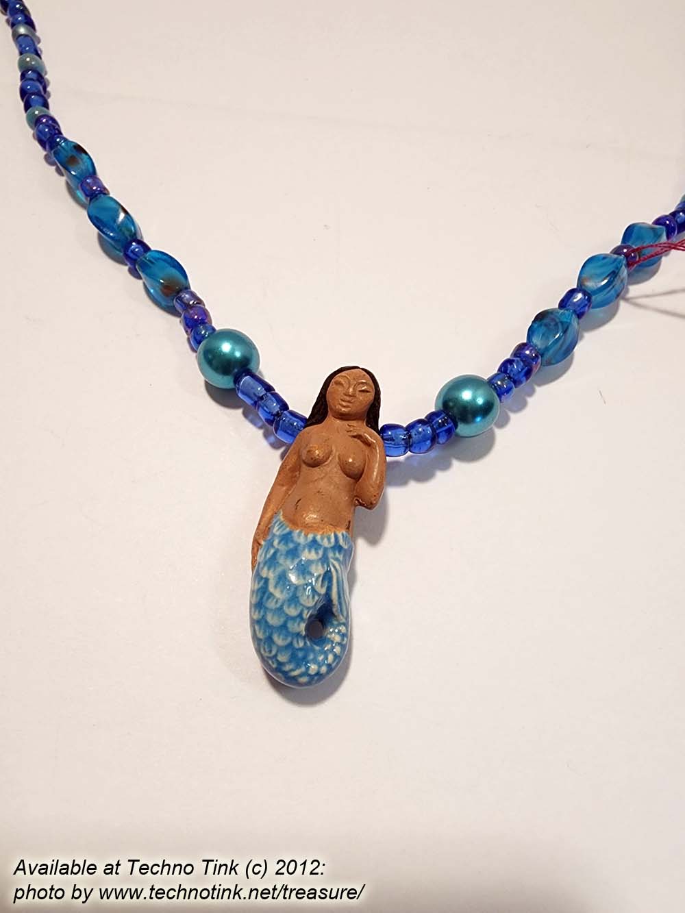Black-haired dark skin Mermaid Clay Pendant on bright blue ball beaded necklace - Image 8