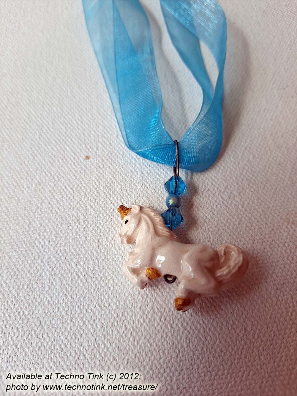 Blue Ribbon Choker with Glazed white Ceramic Unicorn Charm - Image 8