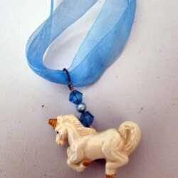 Blue Ribbon Choker with Glazed white Ceramic Unicorn Charm