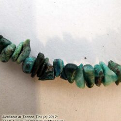 string of medium green chips (possibly jade) 34" x1/8"