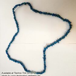 string of medium blue chips (possibly turquoise) 34"  x1/8"