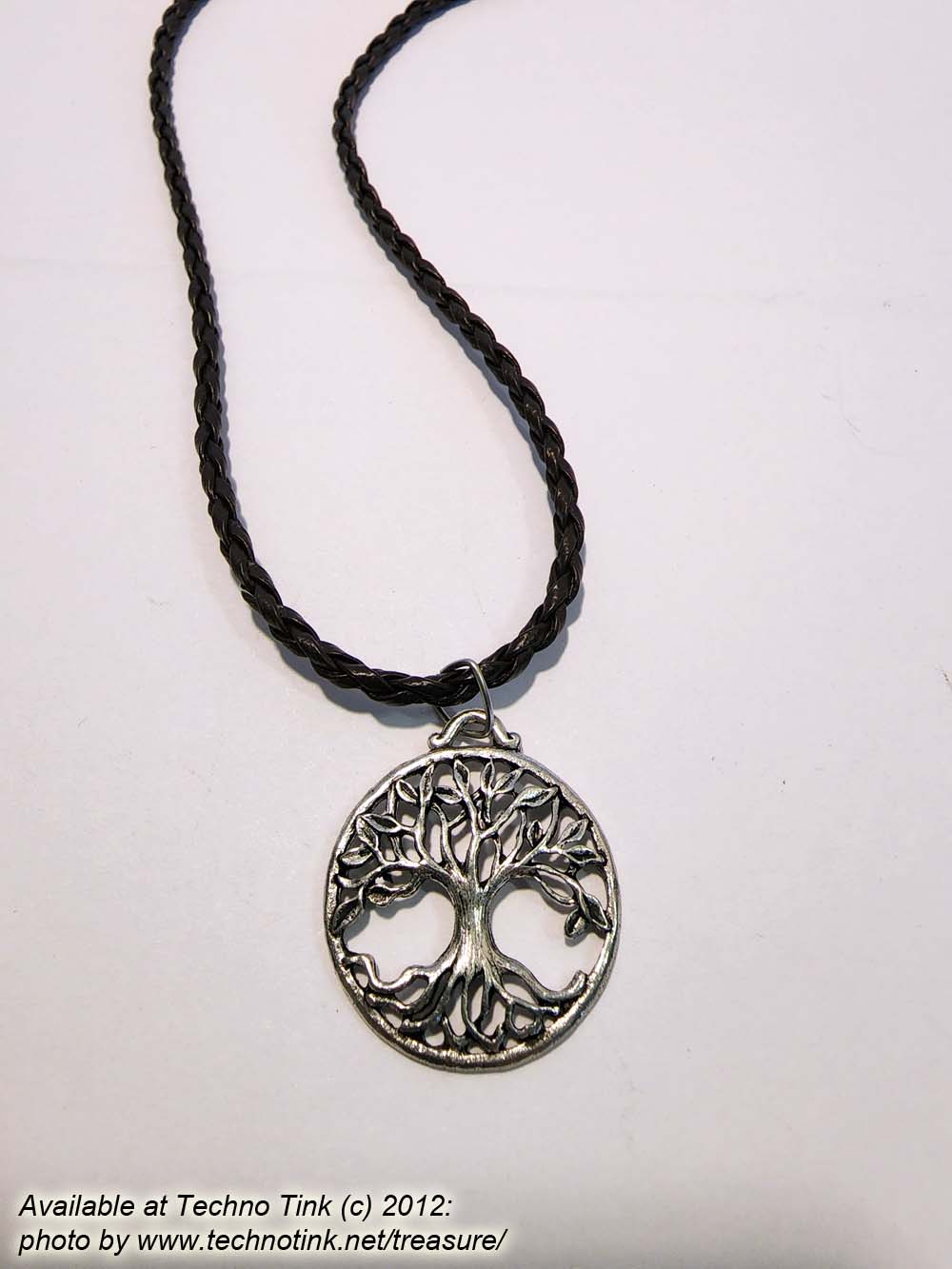 Pewter Hollow Tree-of-Life Circular Pendant on black braided leather necklace
