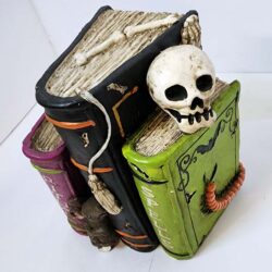 Ceramic or plaster Halloween Bookend of Witchy books