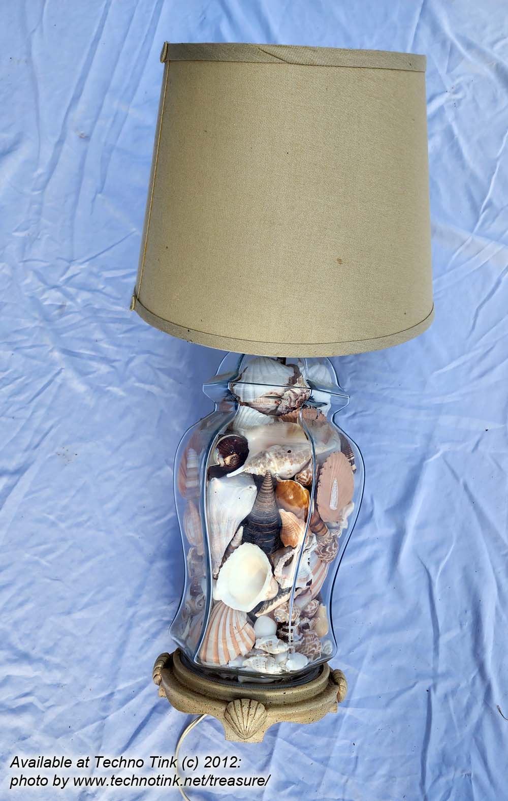 Ornate Glass Vase Lamp filled with various sea shells with shade